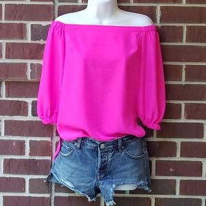 Amanda U. Bright pink off the shoulder top.